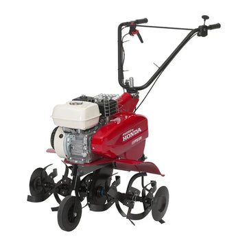 Motobineuse HONDA FG 320 compacte avec moteur 4 temps 163 cm³, guidon réglable, fraises de broyage et grande largeur de travail pour potager. Idéale pour labourer et sarcler efficacement.