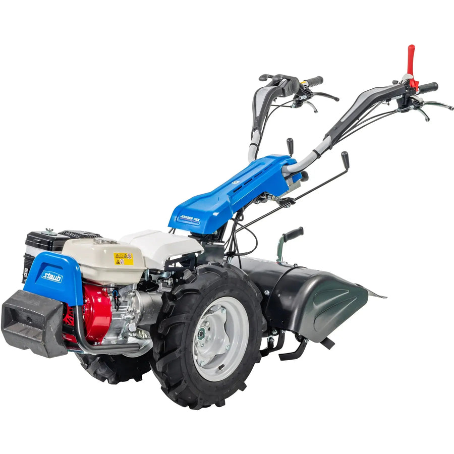 Motoculteur STAUB JOGGER 7H : moteur Honda GX200, 196 cm³, 5,8 ch, fraises arrière 60 cm, 2 vitesses avant / 2 arrière, prise de force, Quick Fit, guidon réversible.